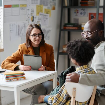 Teacher,Having,Meeting,With,Parent,Of,Schoolboy